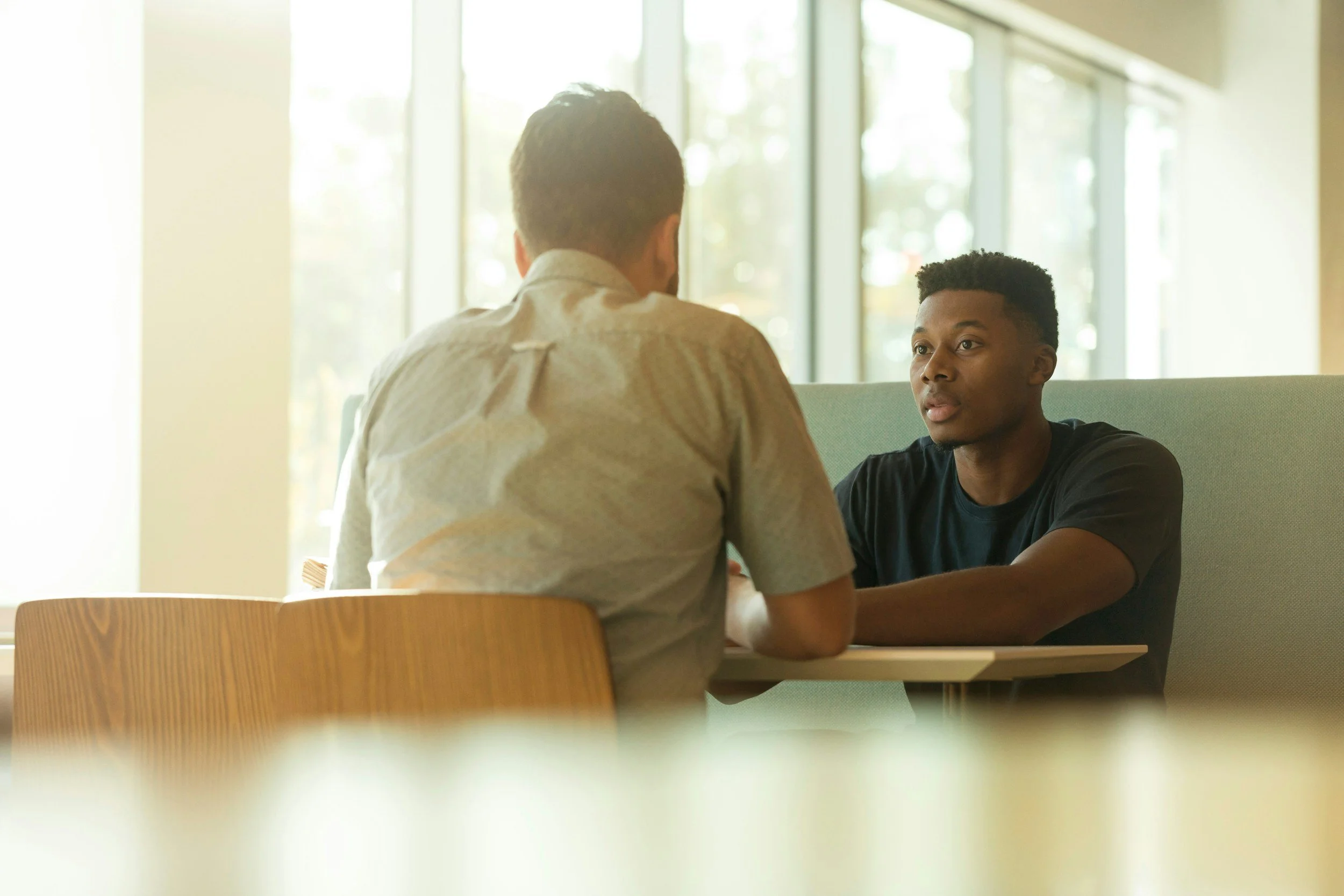 Person sitting in a therapy setting